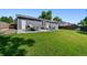 Large backyard with a comfortable patio that includes an outdoor seating area and a grill for social gatherings at 6074 S Dudley Way, Littleton, CO 80123