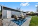 Backyard with patio area featuring outdoor seating, a grill, and a fire pit, perfect for entertaining guests at 6074 S Dudley Way, Littleton, CO 80123
