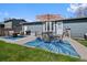 A patio featuring multiple seating areas provides a relaxing outdoor entertainment space at 6074 S Dudley Way, Littleton, CO 80123