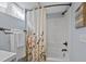 A functional and clean bathroom features a shower and well-maintained fixtures at 6074 S Dudley Way, Littleton, CO 80123