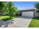 Charming single Gathering home with a large driveway, attached garage, and mature trees in a quiet neighborhood at 6074 S Dudley Way, Littleton, CO 80123