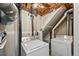 Efficient laundry room with washer and dryer hookups and plenty of space for sorting at 6074 S Dudley Way, Littleton, CO 80123