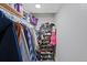 Organized walk-in closet with ample storage for clothing, shoes, and personal items at 6074 S Dudley Way, Littleton, CO 80123