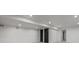 Finished basement features recessed lighting and neutral colors at 5951 S Akron Way, Greenwood Village, CO 80111