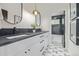 Modern bathroom with dual sinks, vanity, and unique flooring at 5951 S Akron Way, Greenwood Village, CO 80111