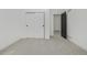 Bedroom with closet and open door to additional space at 5951 S Akron Way, Greenwood Village, CO 80111