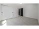 Bedroom with closet and open door to additional space at 5951 S Akron Way, Greenwood Village, CO 80111
