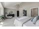 Spacious bedroom with neutral tones, carpet flooring, and stylish decor at 5951 S Akron Way, Greenwood Village, CO 80111