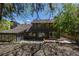 Exterior view of home with deck and backyard at 5951 S Akron Way, Greenwood Village, CO 80111