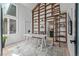Bright home office featuring custom shelving and a contemporary desk at 5951 S Akron Way, Greenwood Village, CO 80111