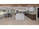 Spacious open-concept kitchen featuring an island, stainless steel appliances, and a breakfast nook at 5951 S Akron Way, Greenwood Village, CO 80111