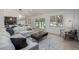 Comfortable living room featuring neutral tones and an open concept design at 5951 S Akron Way, Greenwood Village, CO 80111