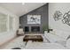 Stylish living room featuring a fireplace, art piece, and sleek decor at 5951 S Akron Way, Greenwood Village, CO 80111