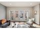 Inviting balcony with seating, perfect for relaxation, with a view of a tree-lined street at 32 Jackson St, Denver, CO 80206