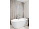 Modern bathroom featuring a soaking tub with stylish tile and contemporary design at 32 Jackson St, Denver, CO 80206