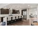 Open kitchen layout with a center island, dark wood cabinets and stainless steel appliances at 32 Jackson St, Denver, CO 80206