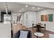 Open-concept living area featuring hardwood floors, and a cozy seating area at 32 Jackson St, Denver, CO 80206