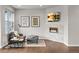 Cozy living room with a modern fireplace, television, and sleek contemporary furnishings at 32 Jackson St, Denver, CO 80206