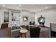 Modern living room featuring a sleek fireplace, comfortable seating, and contemporary design at 32 Jackson St, Denver, CO 80206