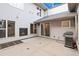 Back patio with fireplace, sliding glass door, and grill, great for outdoor entertaining at 32 Jackson St, Denver, CO 80206