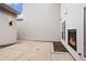 Private patio with a built-in fireplace, providing an ideal outdoor space for relaxation and entertaining at 32 Jackson St, Denver, CO 80206