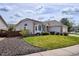 Attractive single-story home with a well-maintained lawn and landscaping at 10060 Oak Leaf Way, Highlands Ranch, CO 80129