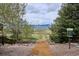 Scenic view of Paine Valley Trail with mountain views and lush greenery at 10060 Oak Leaf Way, Highlands Ranch, CO 80129