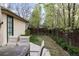 Backyard with patio, lawn, and mature trees at 2260 S Jackson St, Denver, CO 80210