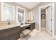 Bright bathroom featuring dual vanities, and a makeup station at 2260 S Jackson St, Denver, CO 80210