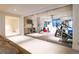 Home gym featuring glass doors, modern equipment, and ample natural light at 2260 S Jackson St, Denver, CO 80210