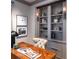 Stylish home office features custom built-ins and designer finishes at 2260 S Jackson St, Denver, CO 80210
