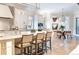 Open kitchen layout with center island and adjoining breakfast nook at 2260 S Jackson St, Denver, CO 80210