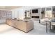 Spacious living room with a large sofa, modern fireplace, and built-in shelving at 2260 S Jackson St, Denver, CO 80210