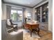 This office features custom built-ins, hardwood floors, and lots of natural light at 2260 S Jackson St, Denver, CO 80210