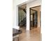 Glass-enclosed wine cellar showcasing a collection of wines and display lighting at 2260 S Jackson St, Denver, CO 80210