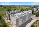 Aerial view of townhomes with rooftop decks and well-maintained landscaping at 1256 Xavier St, Denver, CO 80204