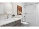 Contemporary bathroom with a white vanity, quartz countertop, and tiled shower-tub combo at 1256 Xavier St, Denver, CO 80204