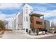 Striking modern townhome showcasing a unique design with mixed materials and spacious balconies at 1256 Xavier St, Denver, CO 80204