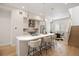 Spacious kitchen with quartz island, stainless steel appliances, and modern pendant lighting at 1256 Xavier St, Denver, CO 80204
