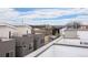 Scenic rooftop view showcasing modern architecture, city skyline, and bright sky, providing an urban oasis at 1256 Xavier St, Denver, CO 80204