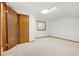 Cozy bedroom with neutral carpet, closet, and window letting in natural light at 10894 Depew Pl, Westminster, CO 80020