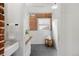 Modern bathroom features a brick accent wall and a sleek, minimalist design at 3640 Newton St, Denver, CO 80211