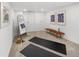 Spacious exercise room features a full length mirror, artwork, and plush carpeting at 3640 Newton St, Denver, CO 80211