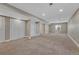 Large finished basement with carpet flooring, recessed lighting, and multiple storage closets at 2976 Open Sky Way, Castle Rock, CO 80109