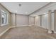 Spacious basement features carpet, neutral walls, recessed lighting, and a small window at 2976 Open Sky Way, Castle Rock, CO 80109