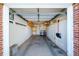 A clean and organized garage space with ample storage and work area at 1421 Jasmine St # 1, Denver, CO 80220