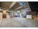Large unfinished basement with concrete floors and walls offers ample storage or customization potential, suitable for various needs at 2917 S Locust St, Denver, CO 80222