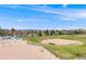 A wide angle shot of a community park featuring a playground, baseball diamond, and expansive green space at 2917 S Locust St, Denver, CO 80222