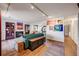 Inviting living room featuring a fireplace, hardwood floors, and colorful wall art at 2917 S Locust St, Denver, CO 80222