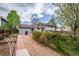 Spacious backyard area with garden, patio and mature trees, offering room to enjoy the outdoors at 18472 E Atlantic Dr, Aurora, CO 80013